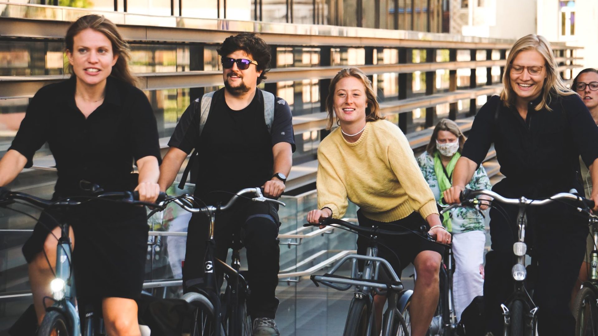 Colleagues cycling to work together.